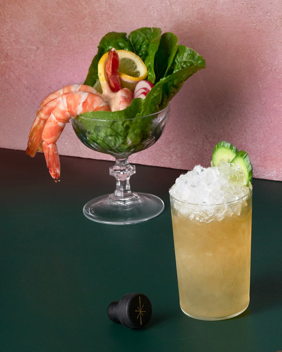 tall glasses cocktails shrimp prawn leaves green ice crushed whisky cap black lemon yellow